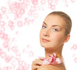 Beautiful blond girl with orchid flower