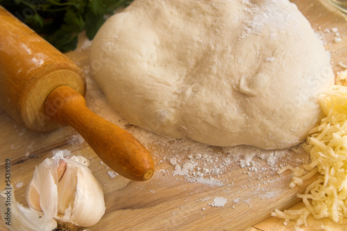 Photo: pizza dough and rolling pin pizza dough and rolling pin
