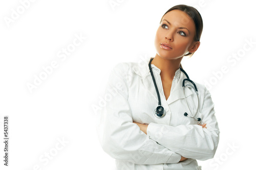 Photo: 20-25 years old beautiful female doctor isolates on white 20-25 years old beautiful female doctor isolates on white