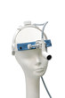 Dummy head with medical headlight