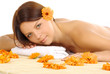 Woman in spa . orange flowers