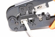 RJ-45, RJ-11 crimping tool with cable. Macro.