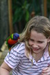 Young girl scared of a bird