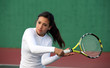 Foto: Teenage girl playing tennis Teenage girl playing tennis
