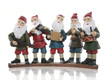 Five elves playing their music instruments at Christmas