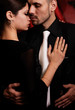 young couple in love dancing at the club