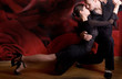 young couple in love dancing Latino dance at the nightclub