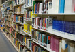 A lot of books on the book shelfs in the library A lot of books on the book shelfs in the library