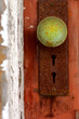 Close up image of a vintage door knob with Patina