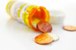 Pill bottle with coins(health care costs) Pill bottle with coins(health care costs)