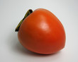 smooth orange hachiya persimmon fruit.