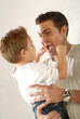 Daddy being silly and making faces with his young son