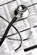 Photo: A Stethoscope over a medical report form. A Stethoscope over a medical report form.