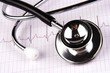 Photo: A stethoscope over a electrocardiogram close up. A stethoscope over a electrocardiogram close up.