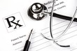 Photo: A Stethoscope over a medical report form. A Stethoscope over a medical report form.