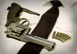 Photo en ligne au meilleur prix revolver and seven bullets laying on a white security shirt