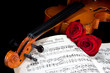 Photo: Sheet music of the Wedding March, with roses and violin Sheet music of the Wedding March, with roses and violin