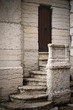 A tiny stairway leading to a mysterious door