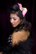 Latin hair model on purple background.