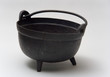 Old black metal pot