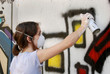 Spray painting on wall.. Spray painting on wall..