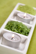 green bath salt and candles