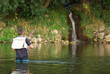 Photo: Fisherman angling on the river Fisherman angling on the river