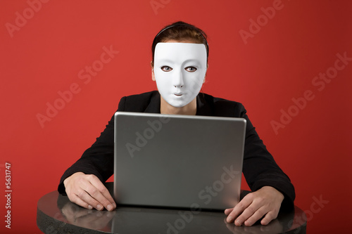Photo: A female surfing the web anonymously A female surfing the web anonymously
