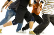 Photo: Group of young men standing in bboys pose Group of young men standing in bboys pose