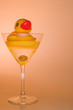 A rubber duck in a martini glass.