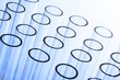 Photo: A bunch of test tubes in plain background. A bunch of test tubes in plain background.