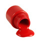 Bright red poster paint spilling onto white background Bright red poster paint spilling onto white background