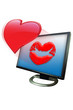 Shinny valentine heart blown as a kiss in a monitor