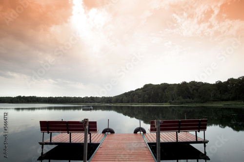 Photo: Twilight landscape with dock on small lake Twilight landscape with dock on small lake