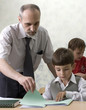 Teacher and  schoolboys