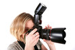 Young woman with camera isolated over white