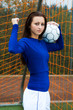 A shot of a happy beautiful soccer player