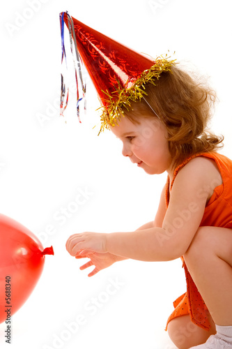 Foto: happy girl playing with colorful balloons happy girl playing with colorful balloons