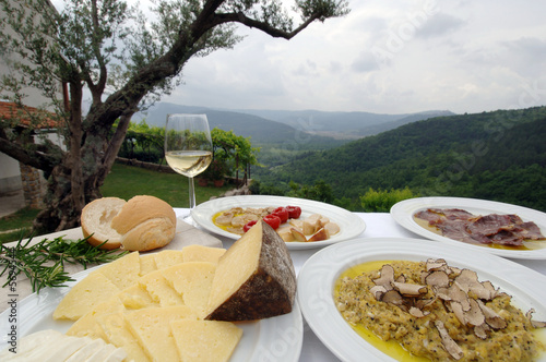 Farmers table set up with goat cheese, truffle and white wine