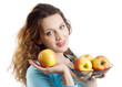 Young women with apples. Isolate on white.