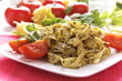Spaghetti with pesto sauce and cheese