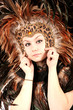 Photo: bohemian woman in feather native mask and hat bohemian woman in feather native mask and hat