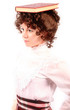 Photo: school girl marm teacher ballancing book on her head school girl marm teacher ballancing book on her head