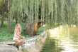 A beautiful young woman with a fishing pole A beautiful young woman with a fishing pole