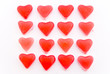 Close up red candy hearts in square isolated on white