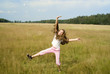 Girl plays on a meadow IV