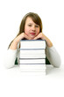Portrait of Happy young schoolgirl reading book
