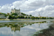 The chateau at saumur on the banks of the river loire.