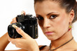 Sexy girl with old photo camera taking a shoot. Sexy girl with old photo camera taking a shoot.