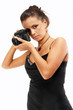Sexy girl with old photo camera watching you. Sexy girl with old photo camera watching you.